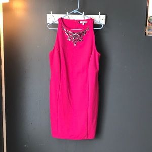 Hot pink Jennifer Lopez dress with necklace detail